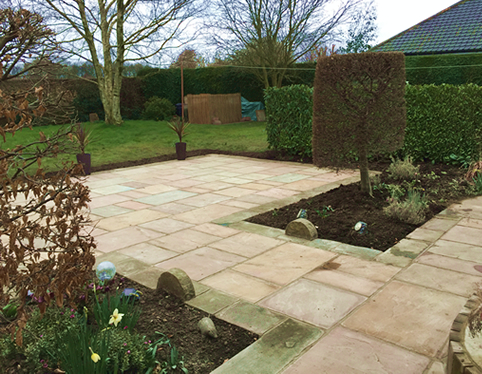patio with borders in silkstone barnsley